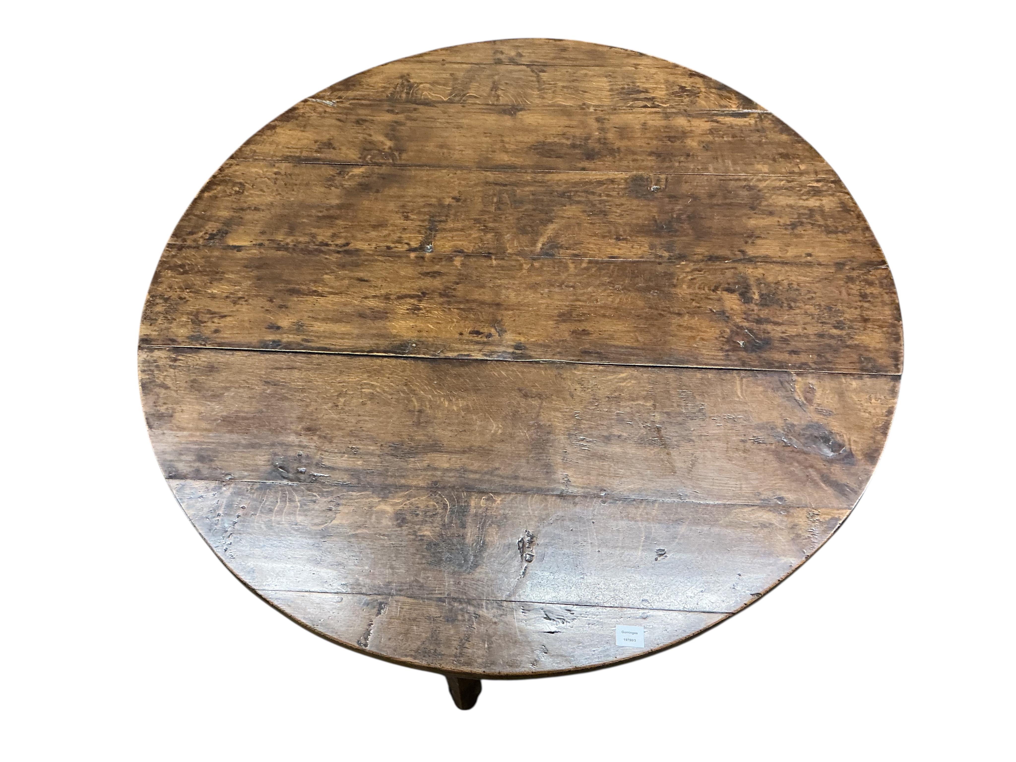 An early 17th century style oak gateleg dining table incorporating earlier elements, width 151cm, depth 62cm, height 75cm